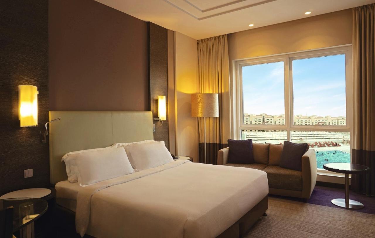 瑞汉希里罗塔纳酒店 艾因 外观 照片 A room at the hotel